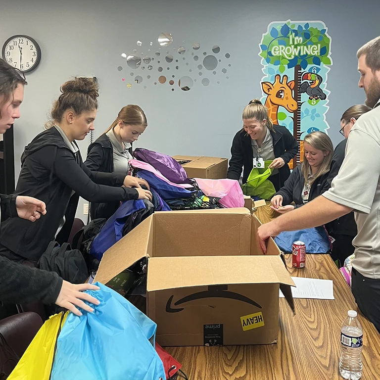 Nursing Students assembling bags for children in the Amish community in Washington County, IN