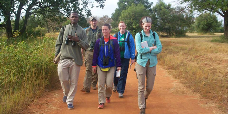 Students walking in the safari